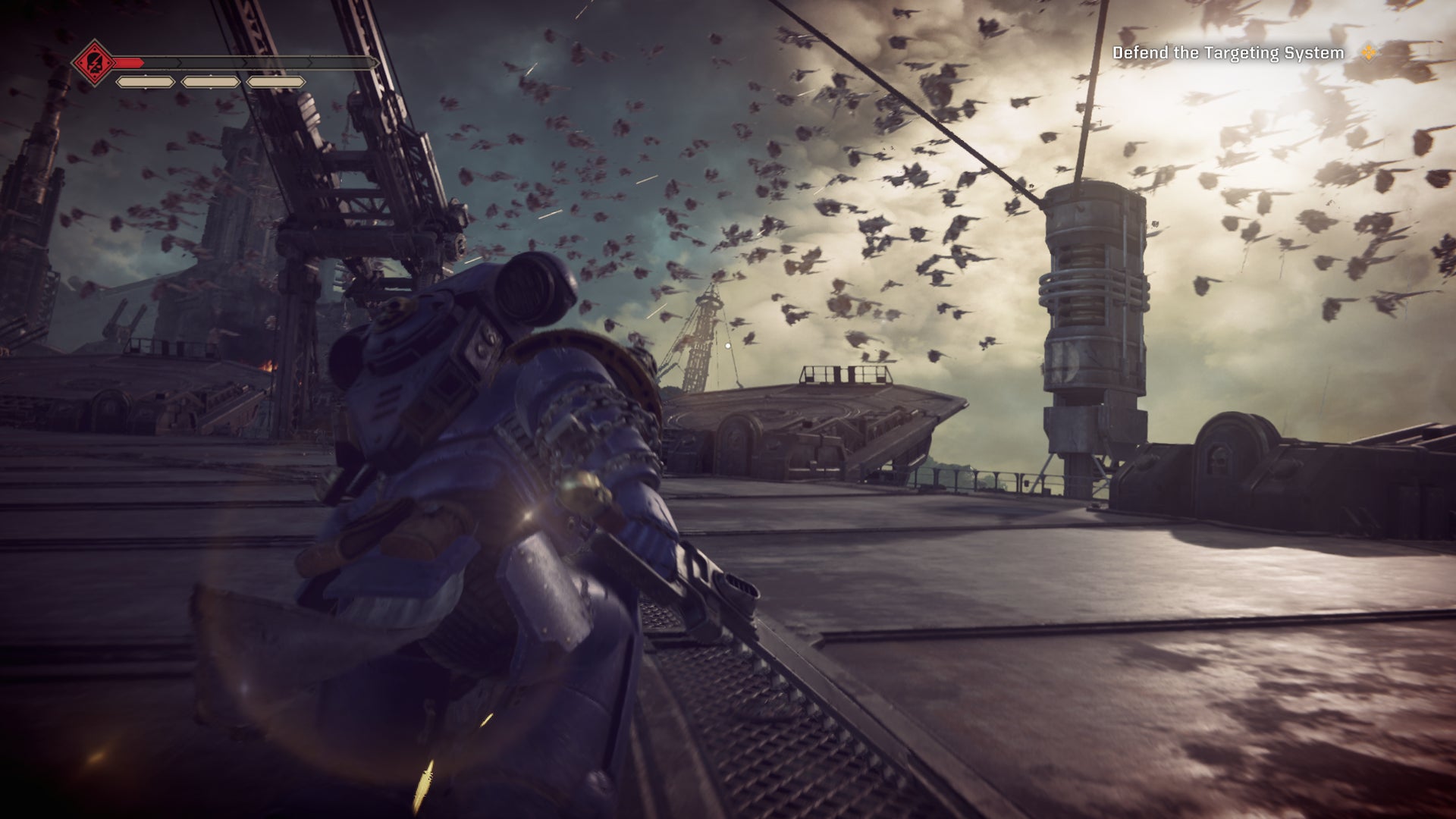 Un marine espacial lucha contra gárgolas. 